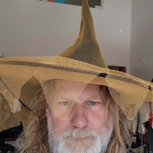 Orange netting over black witch hat - Image 2
