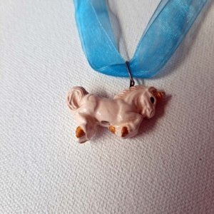 Blue Ribbon Choker with Glazed white Ceramic Unicorn Charm - Image 4