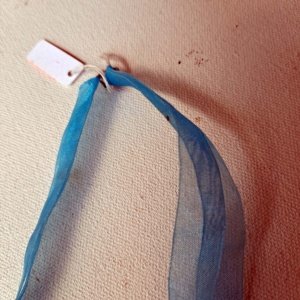 Blue Ribbon Choker with Glazed white Ceramic Unicorn Charm - Image 6