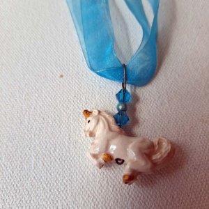 Blue Ribbon Choker with Glazed white Ceramic Unicorn Charm - Image 8