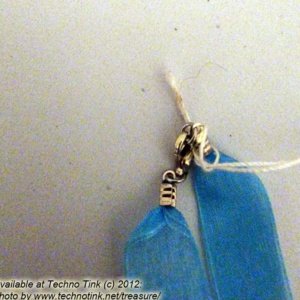 Blue Ribbon Choker with Glazed white Ceramic Unicorn Charm - Image 16