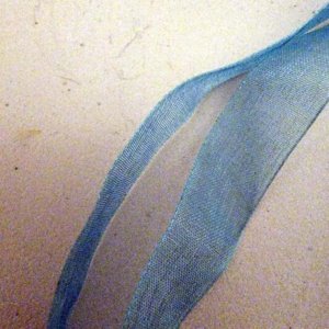 Blue Ribbon Choker with Glazed white Ceramic Unicorn Charm - Image 17