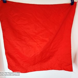 Shiny Red Scarf with solitary skull and swords emblem on it - Image 4
